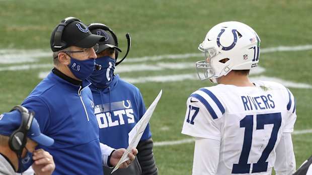 Indianapolis Colts head coach Frank Reich (left) talks strategy with quarterback Philip Rivers during a Week 16 road loss at Pittsburgh.